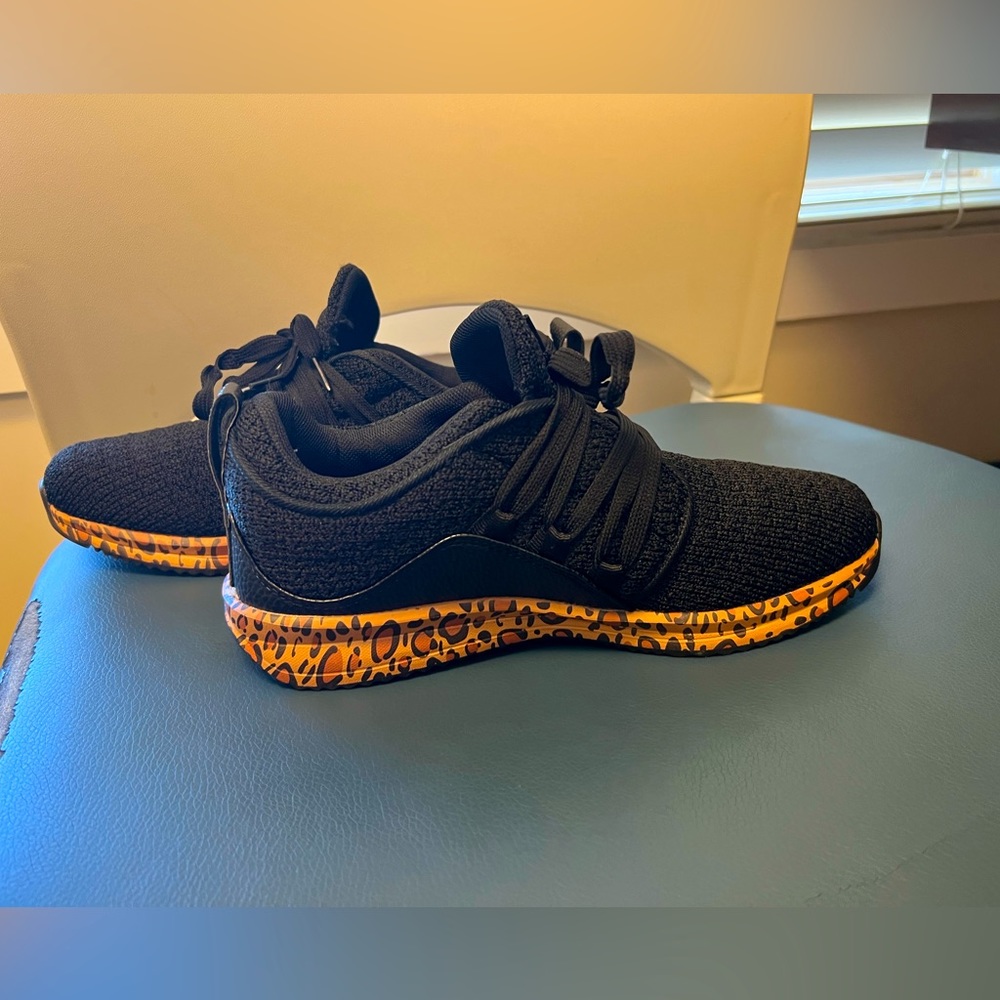 Black fashion shoes with cheetah print